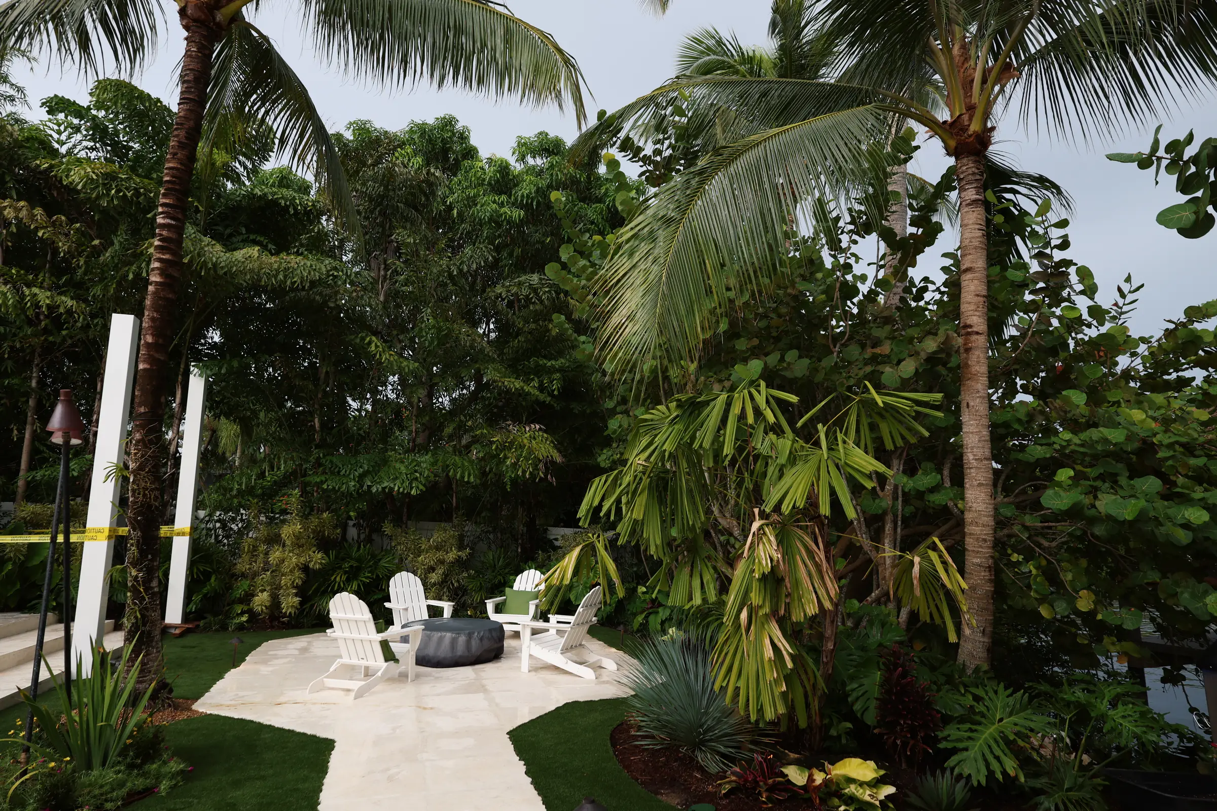 White patio chairs and fire pit