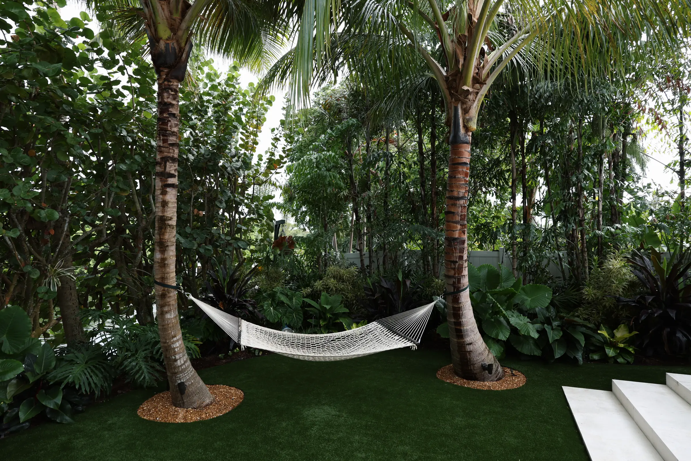 Hammock with white steps and lawn