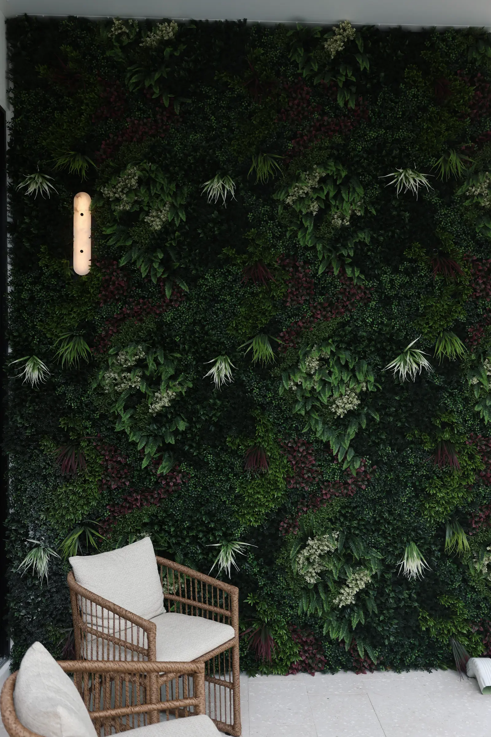 Living wall and rattan chair, vertical