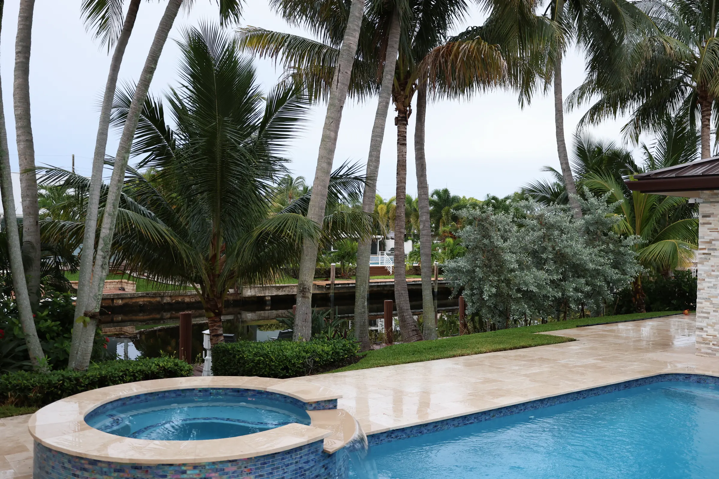 Spa tile edge and pool water